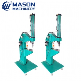 Pneumatic riveting machine